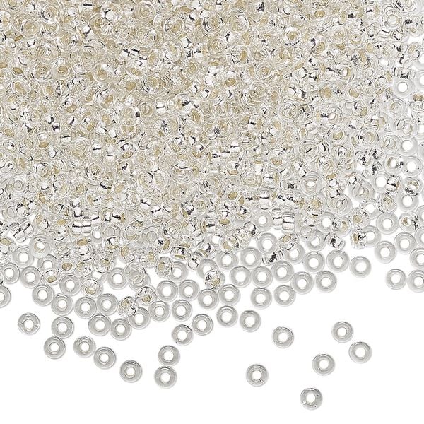 Seed bead, Miyuki, glass, pkg/10g, 2.2x1mm spacer rondelle, transparent silver-lined clear, (SPR2.2-1). image number 0