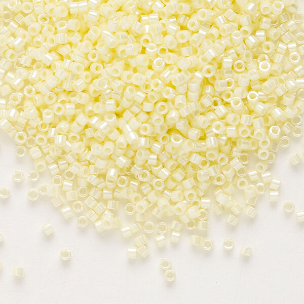 Seed bead, Delica®, glass, pkg/7.5g, #11 round, opaque glazed luster pale yellow (DB-1531). image number 0