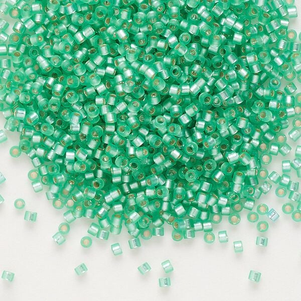 Seed bead, Delica®, glass, pkg/7.5g, #11 round, translucent semi-matte silver-lined mint green (DB-0691). image number 0