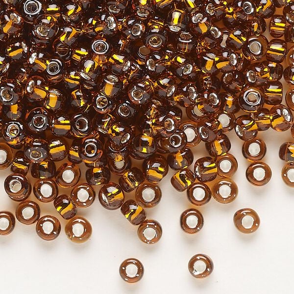 Seed bead, Dyna-Mites™, glass, transparent silver-lined root beer, #6 round. Sold per 1/2 kilogram pkg. image number 0