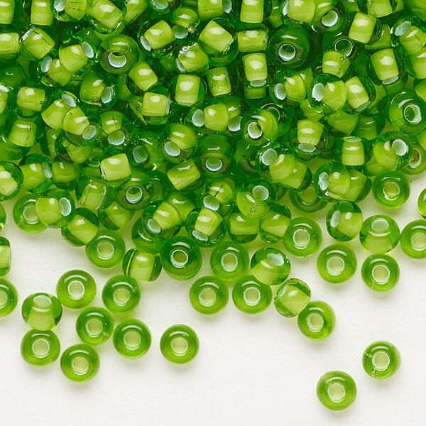 Seed bead, Preciosa Ornela, glass, transparent chalkwhite-lined green, #6 rocaille. Sold per 50-gram pkg. image number 0