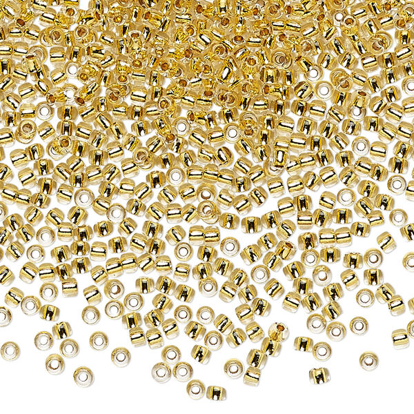 Seed bead, TOHO BEADS®, glass, pkg/4g, #11 round, transparent 24Kt gold-lined crystal clear (TR-11-701). image number 0