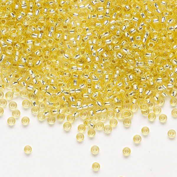 Seed bead, Preciosa Ornela Czech glass, pkg/500g, #11 rocaille, translucent solgel dyed silver-lined yellow, (78181). image number 0