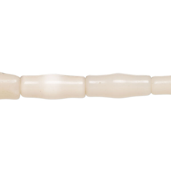 Bead, cat's eye glass (fiber optic glass), peach, 15x5mm-17x7mm bamboo, economy grade. Sold per 15-inch strand. image number 0