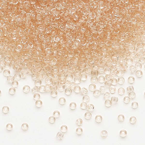 Seed bead, Dyna-Mites™, glass, pkg/1/2kg, #11 round, transparent light peach, (9 11/0 RR). image number 0