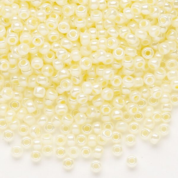 Seed bead, Dyna-Mites™, glass, opaque ceylon pastel cream, #8 round. Sold per 40-gram pkg. image number 0