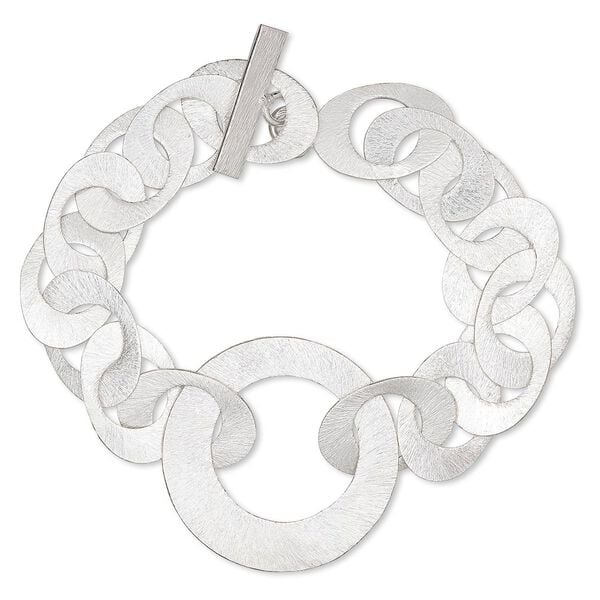 Bracelet, silver-plated copper, 22x15mm interlocking brushed oval with round cutout and 36mm brushed open round, 7 inches with toggle clasp. Sold individually. image number 0