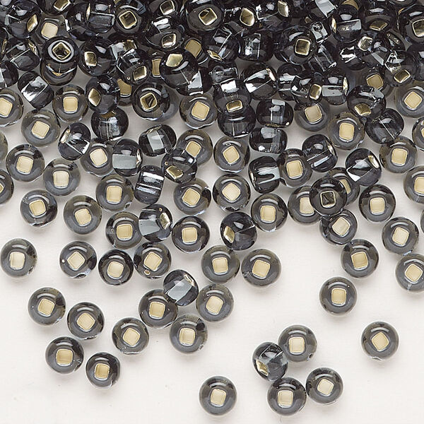 Seed bead, Preciosa Ornela Czech glass, pkg/500g, #6 rocaille, transparent silver-lined grey, (47010). image number 0