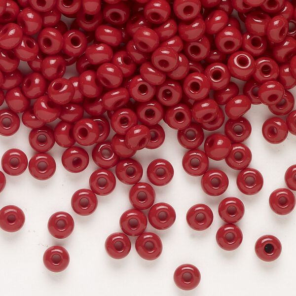 Seed bead, Preciosa Ornela, glass, opaque red coral, #6 rocaille. Sold per 50-gram pkg. image number 0