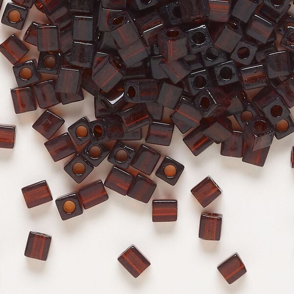 Seed bead, Miyuki, glass, pkg/25g, 3.5-3.7mm square, transparent dark amber yellow (SB-134). image number 0