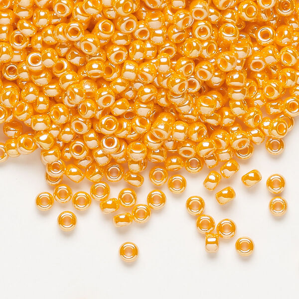 Seed bead, Miyuki, glass, pkg/250g, #8 rocaille, opaque luster mandarin orange, (RR-423). image number 0