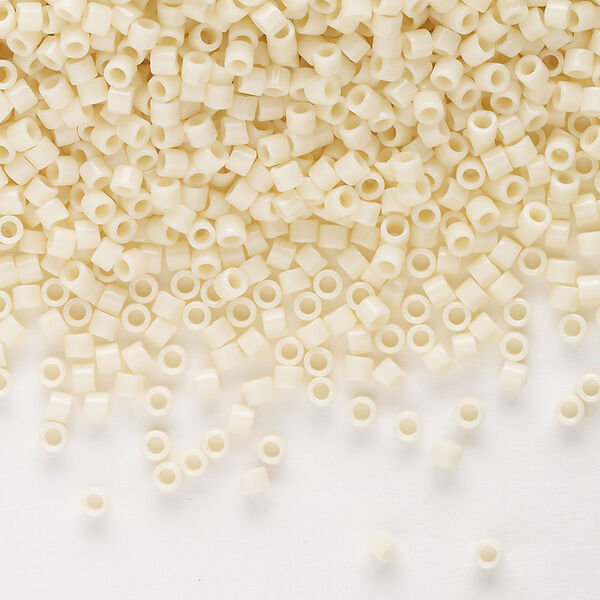 Seed bead, Delica®, glass, pkg/7.5g, #10 round, opaque ivory (DBM-0732). image number 0