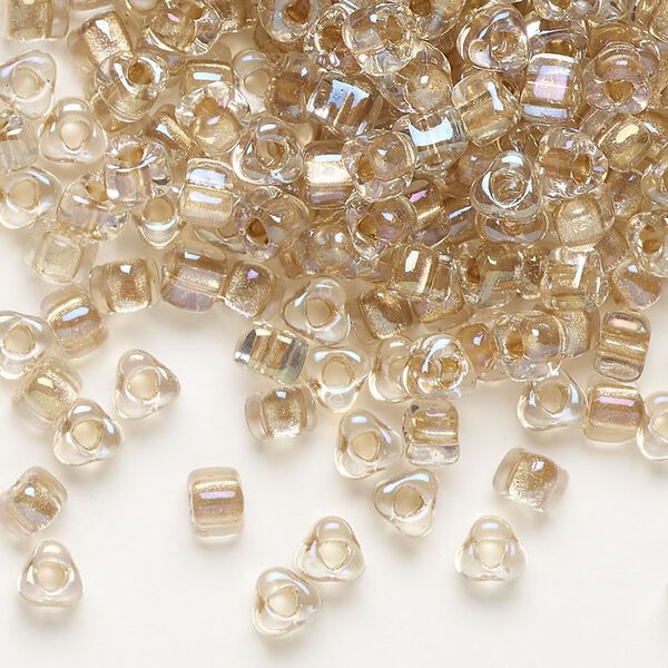 Seed bead, Miyuki, glass, transparent clear color-lined bronze, (TR1133), #5 triangle. Sold per 250-gram pkg. image number 0