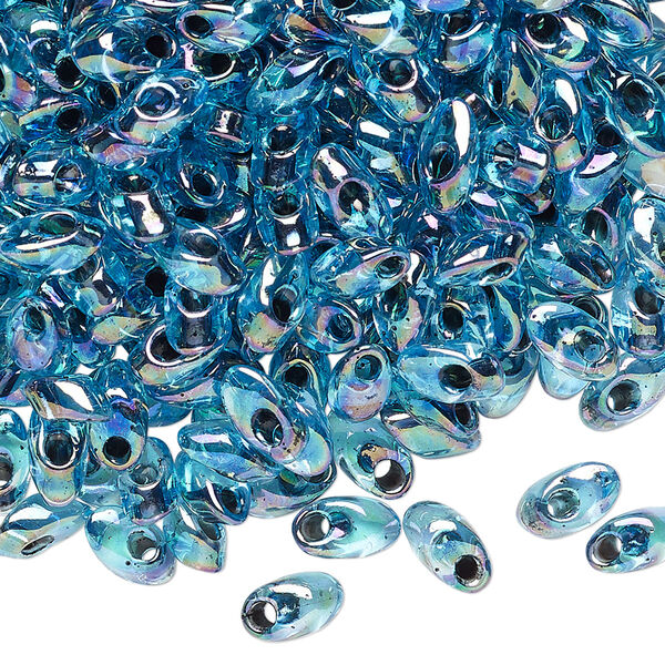 Seed bead, Miyuki, glass, pkg/50g, 7x4mm long magatama, translucent black inside dyed color aqua blue, (LMA-2168). image number 0