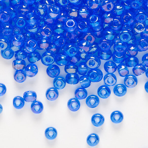Seed bead, Preciosa Ornela Czech glass, pkg/50g, #6 rocaille, translucent rainbow light blue, (31050). image number 0
