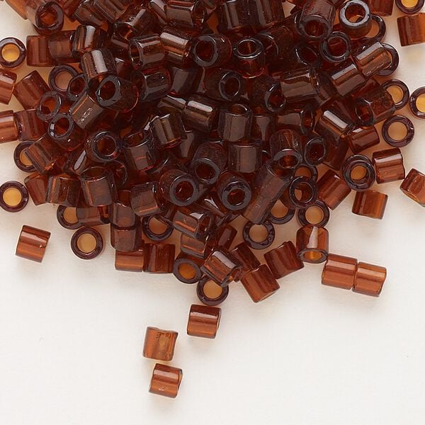 Seed bead, Delica®, glass, pkg/250g, #8 round, transparent dark topaz (DBL-0709). image number 0