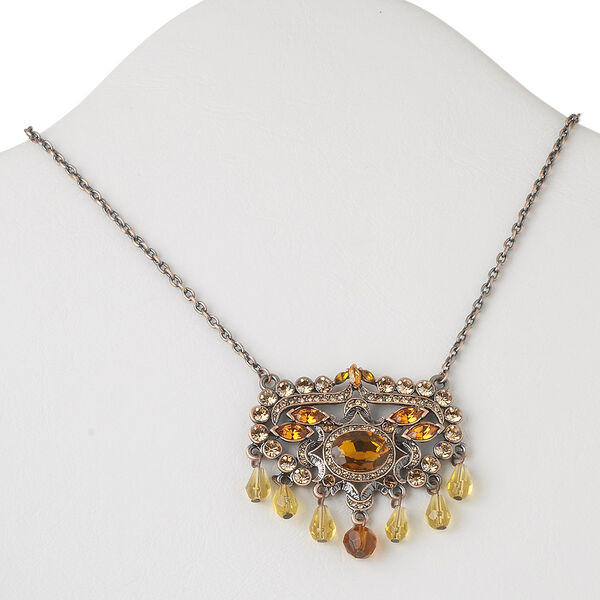 Necklace, Czech glass rhinestone / acrylic / antiqued copper-finished steel and brass, yellow and orange, 52x48mm flat oval with dangles, 16 inches with 2-inch extender chain and lobster claw clasp. Sold individually. image number 0