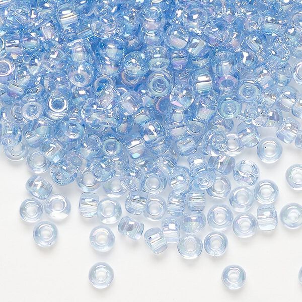 Seed bead, Dyna-Mites™, glass, translucent rainbow light blue, #6 round. Sold per 1/2 kilogram pkg. image number 0