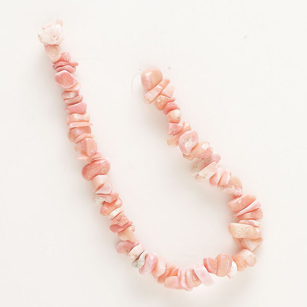 Bead, bamboo coral (dyed), pink, medium chip, Mohs hardness 3-1/2 to 4. Sold per 8-inch strand, approximately 65 beads. image number 0