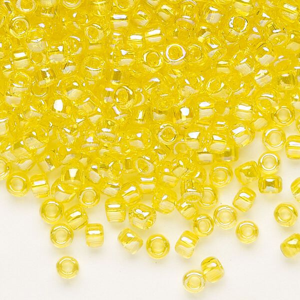 Seed bead, Dyna-Mites™, glass, transparent rainbow yellow, #6 round. Sold per 40-gram pkg. image number 0