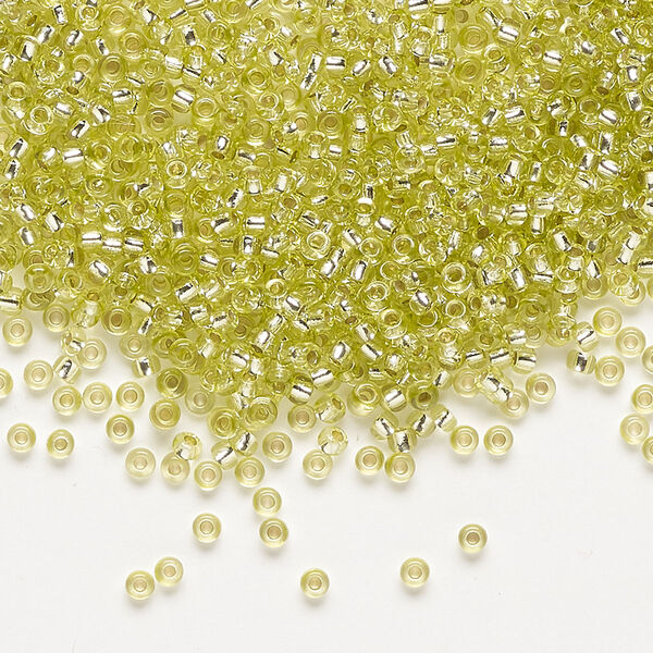 Seed bead, Preciosa Ornela Czech glass, pkg/500g, #11 rocaille, translucent solgel dyed silver-lined lemon, (78153). image number 0