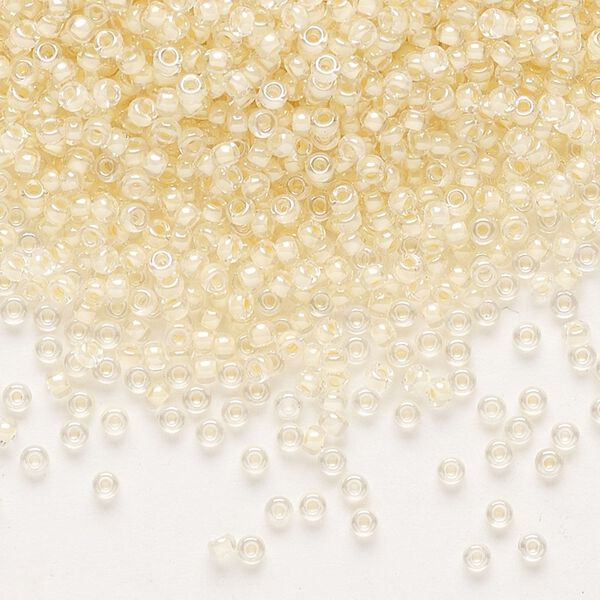 Seed bead, Miyuki, glass, pkg/250g, #11 rocaille, translucent ivory-lined luster crystal clear (RR-2215). image number 0