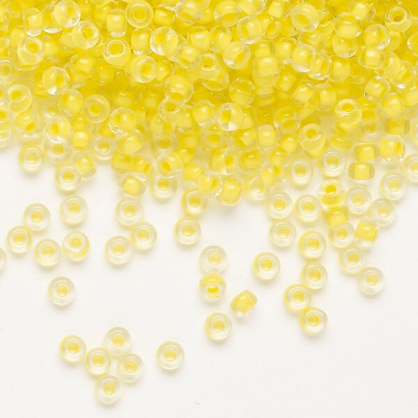 Seed bead, Preciosa Ornela Czech glass, pkg/50g, #8 rocaille, transparent terra intensive yellow-lined clear, (08A86). image number 0