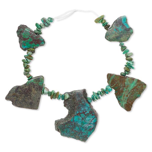 Bead, turquoise (dyed / stabilized), blue, medium chip and 24x16mm-54x42mm graduated flat freeform, Mohs hardness 5 to 6. Sold per 7-inch strand. image number 0