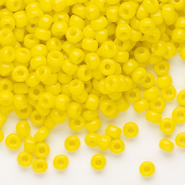 Seed bead, Dyna-Mites™, glass, opaque yellow, #6 round. Sold per 1/2 kilogram pkg. image number 0
