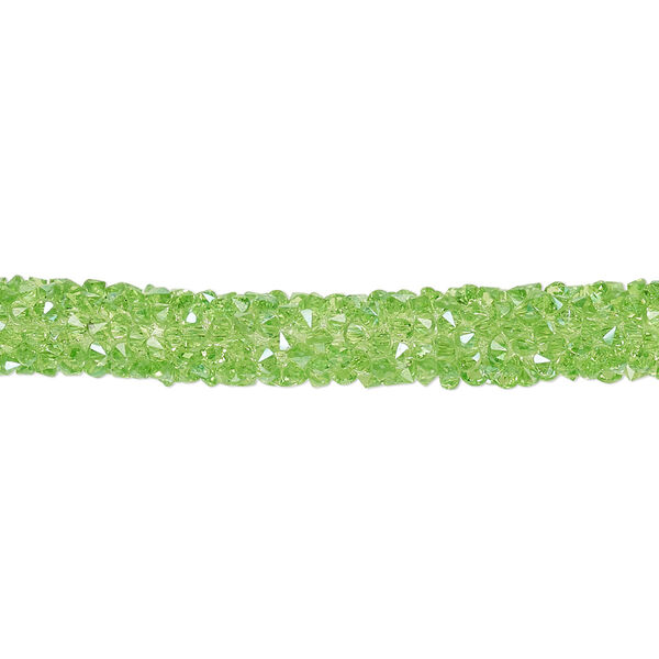 Tube, PVC plastic and glass rhinestone, transparent green, 6-7mm wide. Sold per 8-inch section. image number 0