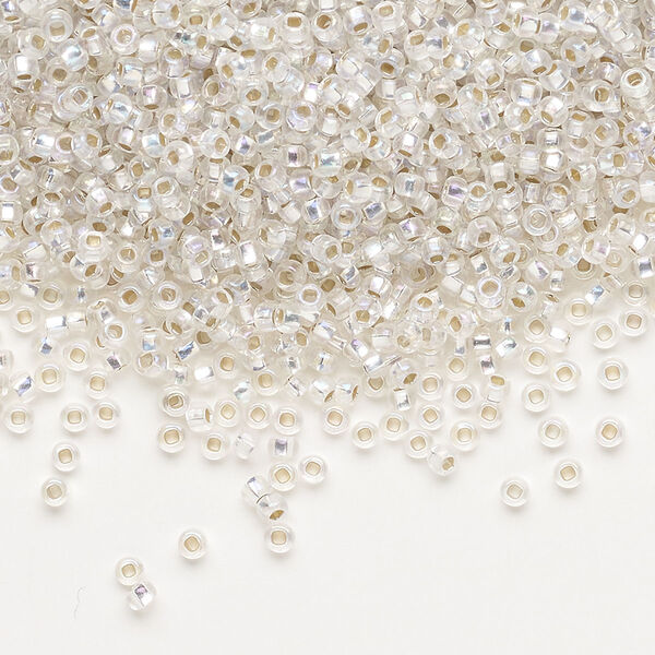 Seed bead, Preciosa Ornela Czech glass, pkg/500g, #11 rocaille, translucent silver-lined rainbow clear, (78109). image number 0