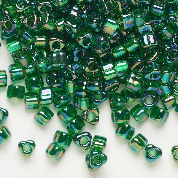 Seed bead, Miyuki, glass, transparent iris green, (TR1154), #5 triangle. Sold per 25-gram pkg. image number 0