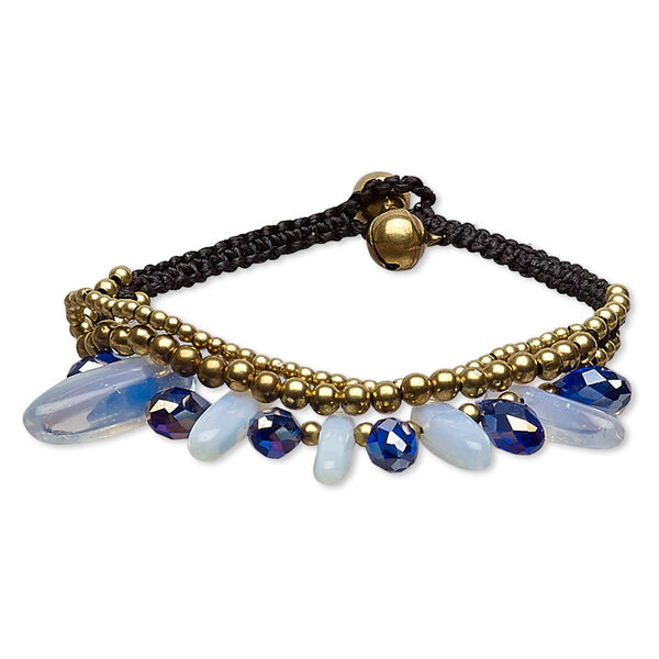 Bracelet, glass / sea "opal" glass / nylon / gold-finished steel / brass, cobalt AB and black, 19mm wide with chip and bells, adjustable at 7 and 7-1/2 inches with button clasp. Sold individually. image number 0
