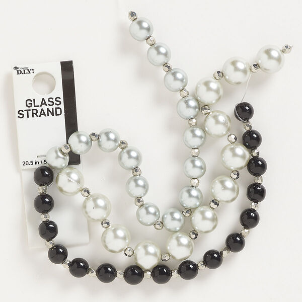 Bead, glass, opaque black and silver, 8-12mm round and 4mm faceted round. Sold per 20-1/2 inch strand. image number 0