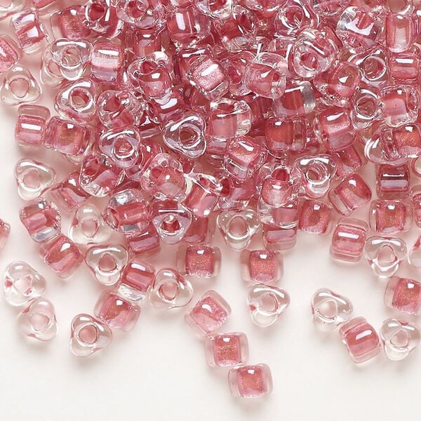 Seed bead, Miyuki, glass, transparent clear color-lined rose, (TR1132), #5 triangle. Sold per 250-gram pkg. image number 0