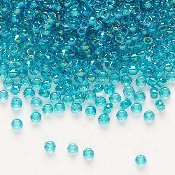 Seed bead, Miyuki, glass, pkg/50g, #8 rocaille, translucent teal-lined luster crystal clear (RR-3742). image number 0