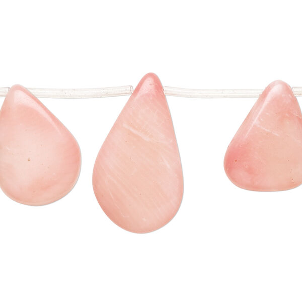 Bead, bamboo coral (dyed), pink, 10x7mm-22x9mm graduated hand-cut top-drilled flat teardrop, B- grade, Mohs hardness 3-1/2 to 4. Sold per 15-1/2" to 16" strand. image number 0