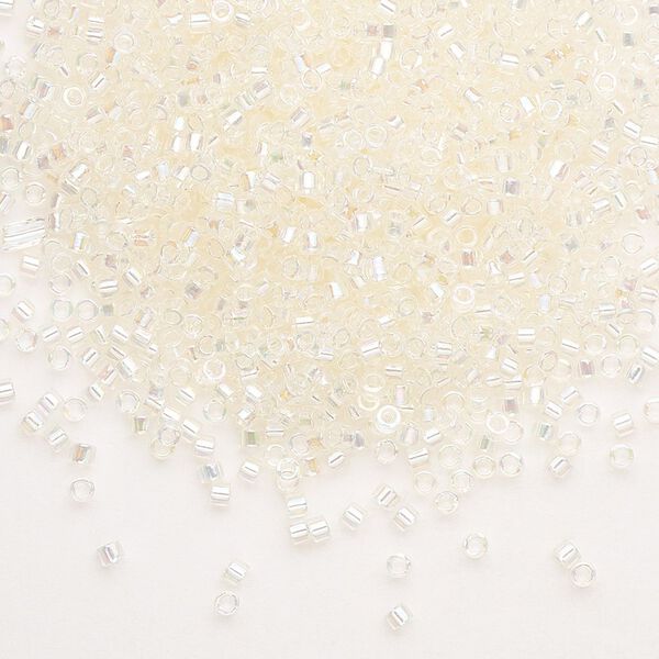 Seed bead, Delica®, glass, pkg/250g, #11 round, translucent rainbow glazed luster crystal ivory (DB-0109). image number 0