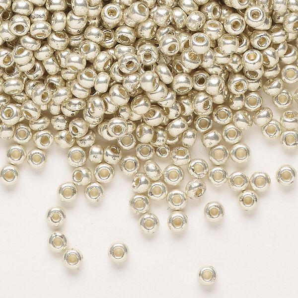 Seed bead, Preciosa Ornela Czech glass, pkg/500g, #8 rocaille, opaque silver finish metallic clear, (18303). image number 0