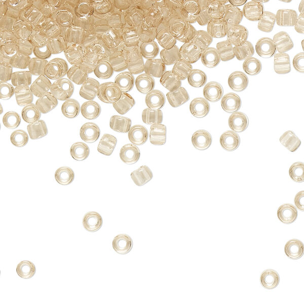 Seed bead, TOHO BEADS®, glass, pkg/50g, #8 round, transparent rosaline (TR-08-11). image number 0