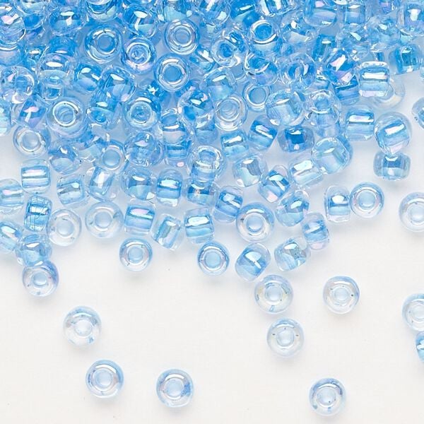 Seed bead, Dyna-Mites™, glass, transparent rainbow inside color blue, #6 round. Sold per 40-gram pkg. image number 0