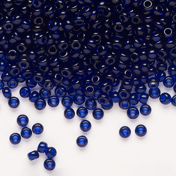 Seed bead, Preciosa Ornela Czech glass, pkg/50g, #8 rocaille, transparent navy blue, (30110). image number 0