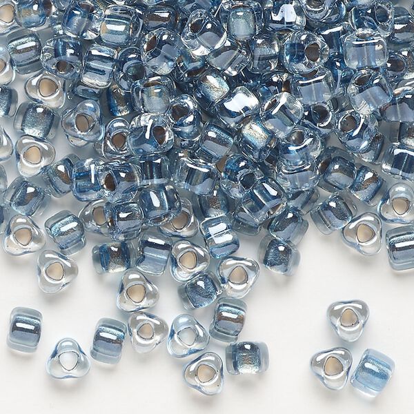 Seed bead, Miyuki, glass, transparent clear color-lined dark blue, (TR1115), #5 triangle. Sold per 250-gram pkg. image number 0