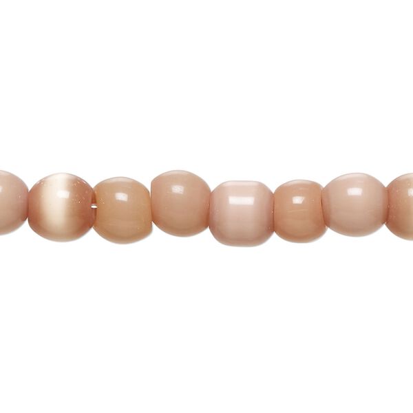 Bead, cat's eye glass (fiber optic glass), light peach, 5-8mm irregular round. Sold per 14-inch strand, approximately 60 beads. image number 0