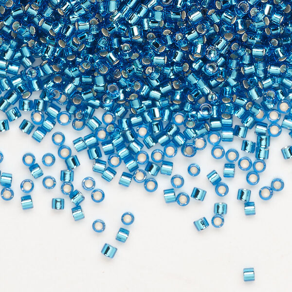 Seed bead, Delica®, glass, pkg/250g, #10 round, transparent silver-lined Capri blue (DBM-0149). image number 0