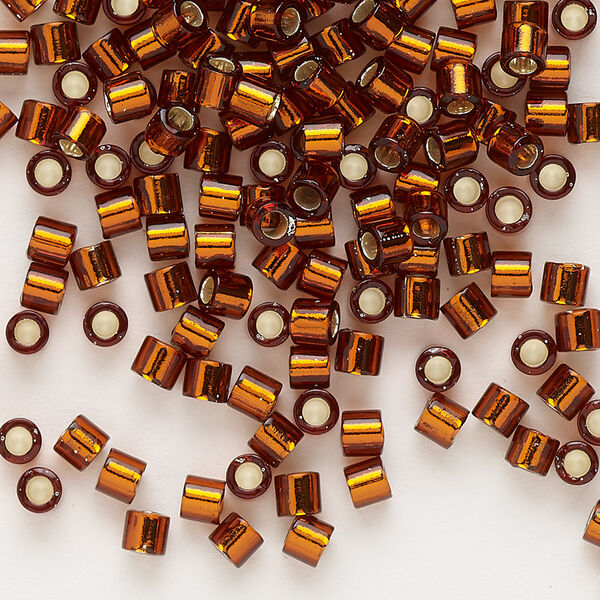 Seed bead, Delica®, glass, pkg/50g, #8 round, transparent silver-lined dark topaz (DBL-0144). image number 0