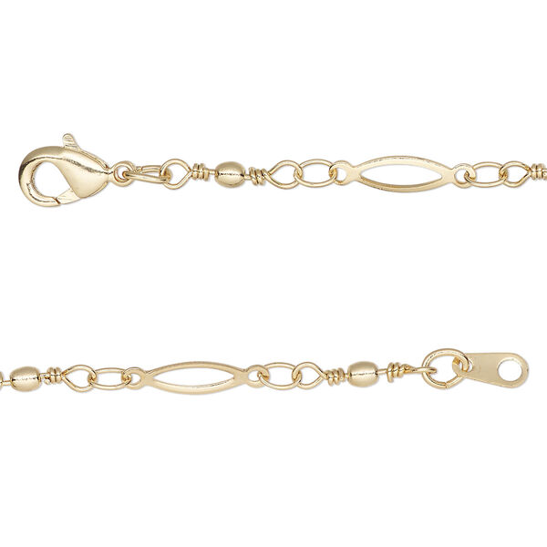 Chain, gold-finished brass, 11x2mm open oval and handmade wire-wrapped links with 2mm ball, 20 inches with lobster claw clasp. Sold individually image number 0