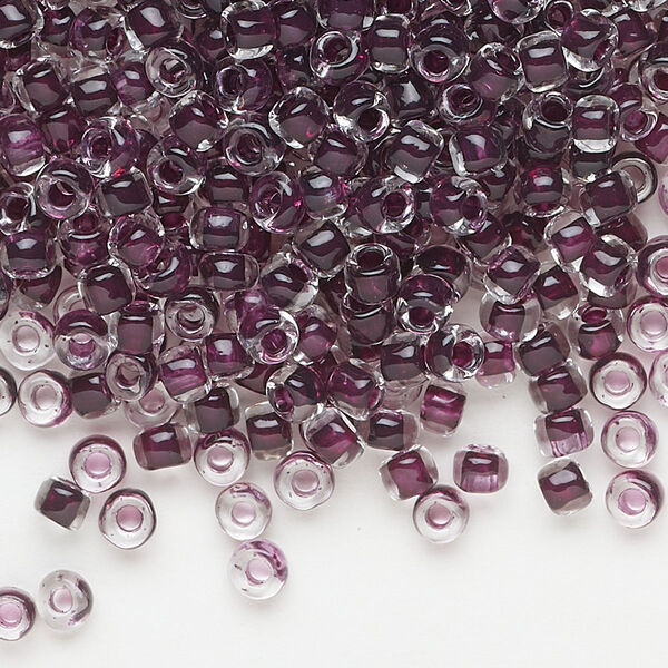 Seed bead, Dyna-Mites™, glass, translucent inside color dark mauve, #6 round. Sold per 1/2 kilogram pkg. image number 0