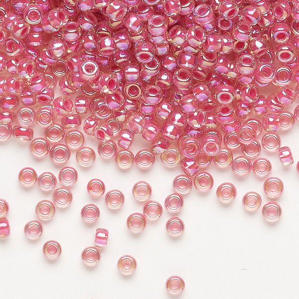 Seed bead, Miyuki, glass, pkg/50g, #8 rocaille, translucent hot pink-lined rainbow crystal clear (RR-355). image number 0