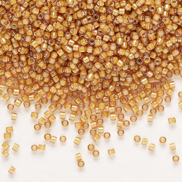 Seed bead, Delica®, glass, pkg/250g, #11 round, translucent white-lined luster topaz (DB-1778). image number 0